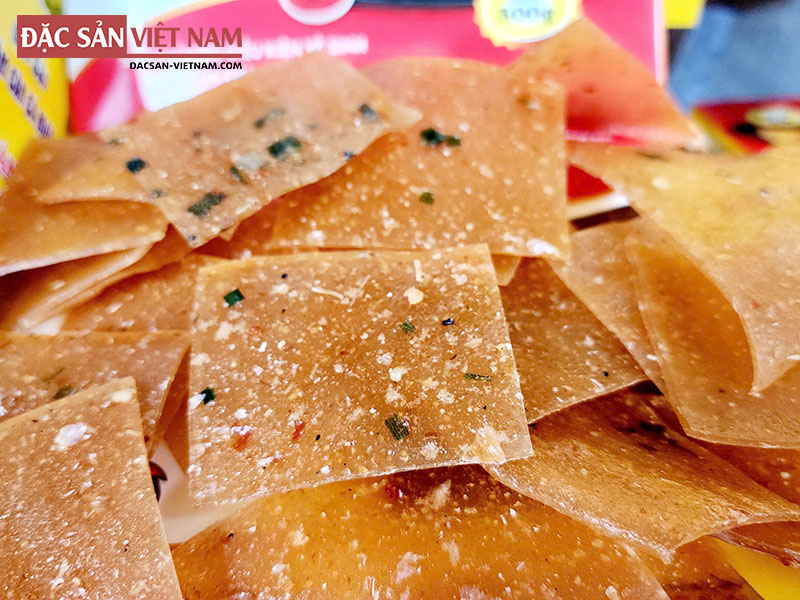 Uncooked Nam Can shrimp cracker slices before frying